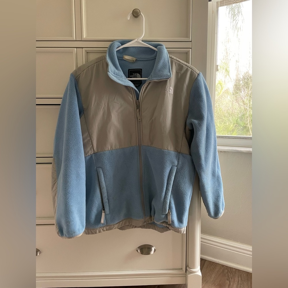 Light blue fleece north face jacket